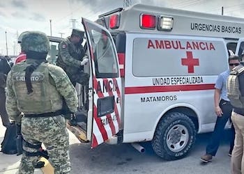 An ambulance arrives Matamoros, Tamaulipas, where the Gulf Cartel has admitted its role in the killing of two US citizens.