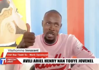 A screenshot from an interview with Vitel'Homme Innocent, leader of Haiti's Krazy Barye gang, and new suspect in the murder of former Haitian president, Jovenel Moise