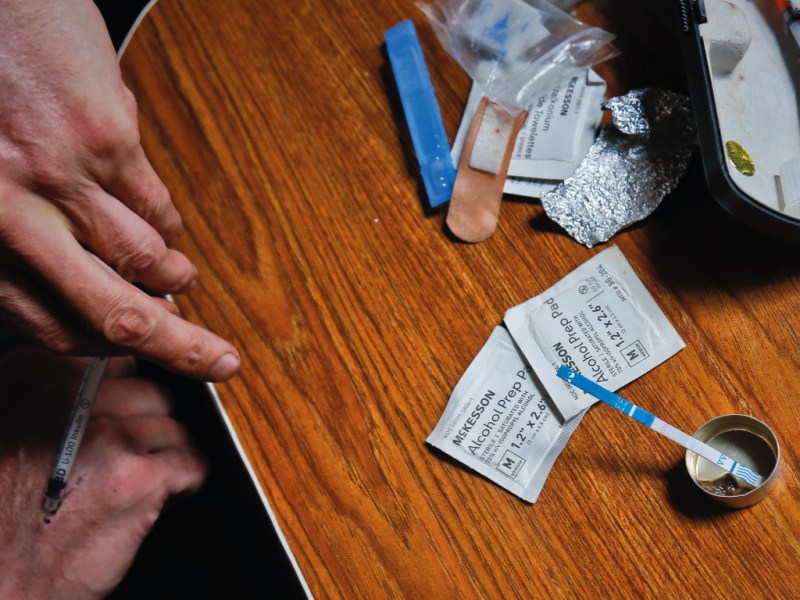 A photo of a person injecting fentanyl.