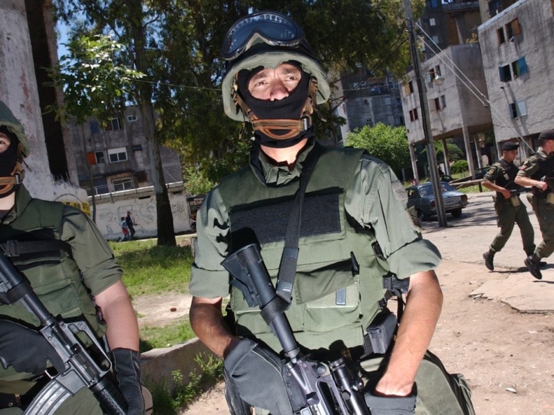 An armed National Guardsman patrolling a Buenos Aires neighborhood following a rise in criminality, in particular ransom kidnappings, in 2003.
