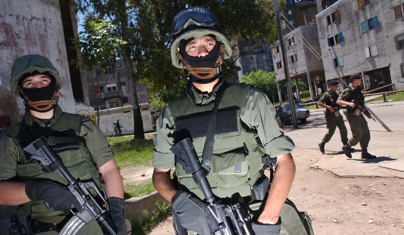 An armed National Guardsman patrolling a Buenos Aires neighborhood following a rise in criminality, in particular ransom kidnappings, in 2003.