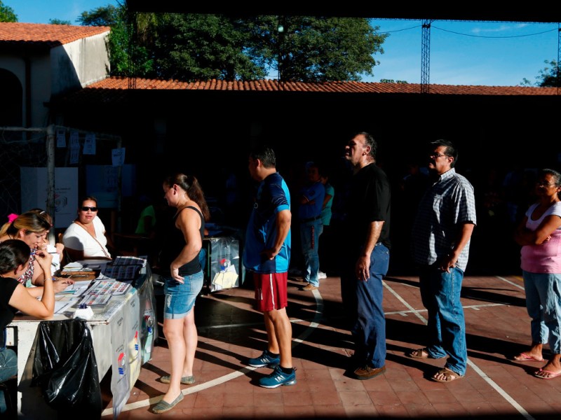 A queue at the voting booth ahead of Paraguay's elections in 2018.