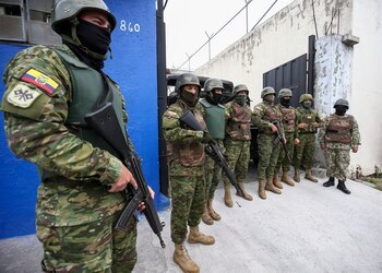 Ecuadorian soldiers guard a prison