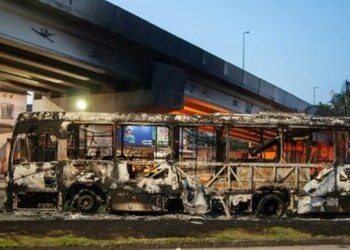 A bus in Rio de Janeiro which was set on fire by militias in Brazil.